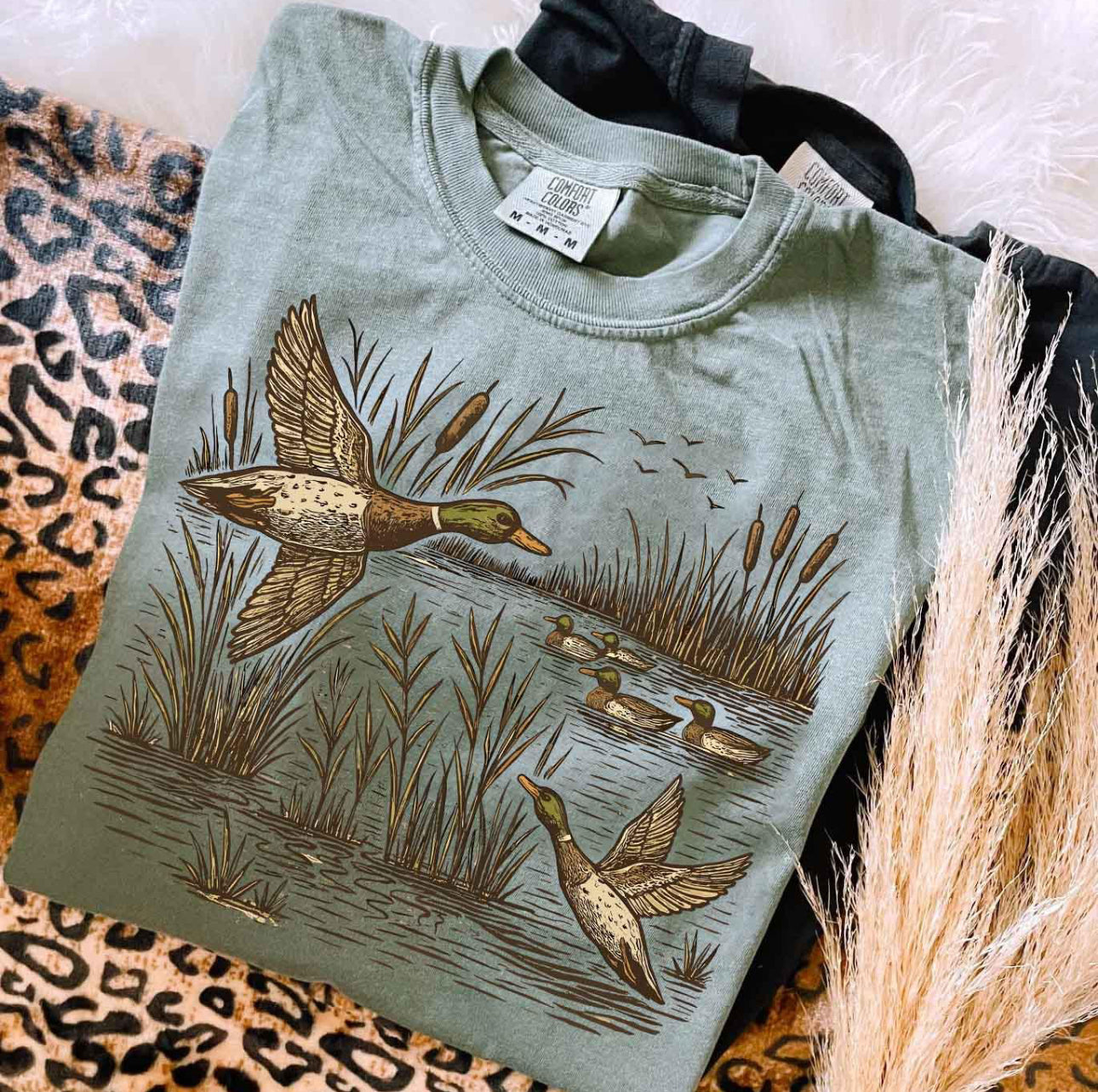 Retro flying mallard duck